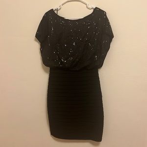 Black formal dress. Top is blousy sequins